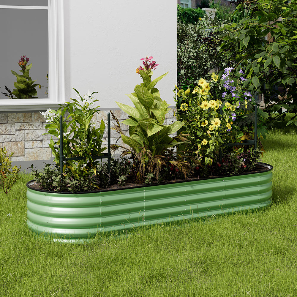 Light green oval raised garden bed in garden – ideal for growing plants, herbs, and vegetables outdoors
