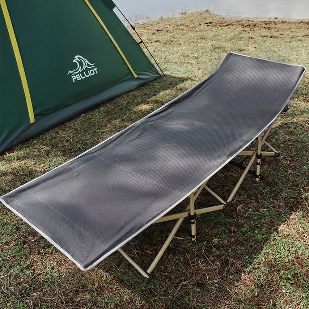 Foldable Outdoor Camping Bed Set Up at Campsite - Comfortable steel frame cot for tent or backyard use