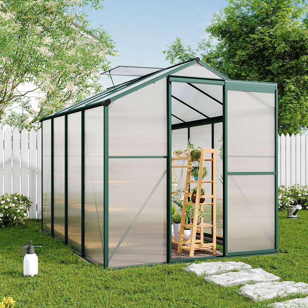 freestanding 8x6ft aluminium greenhouse placed on patio – perfect for year-round gardening