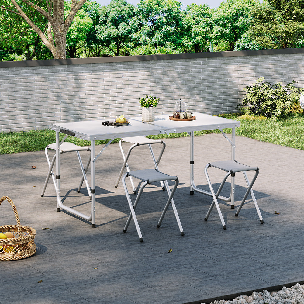 White Folding Camping Table Set with 4 Stools in Outdoor Picnic Setting