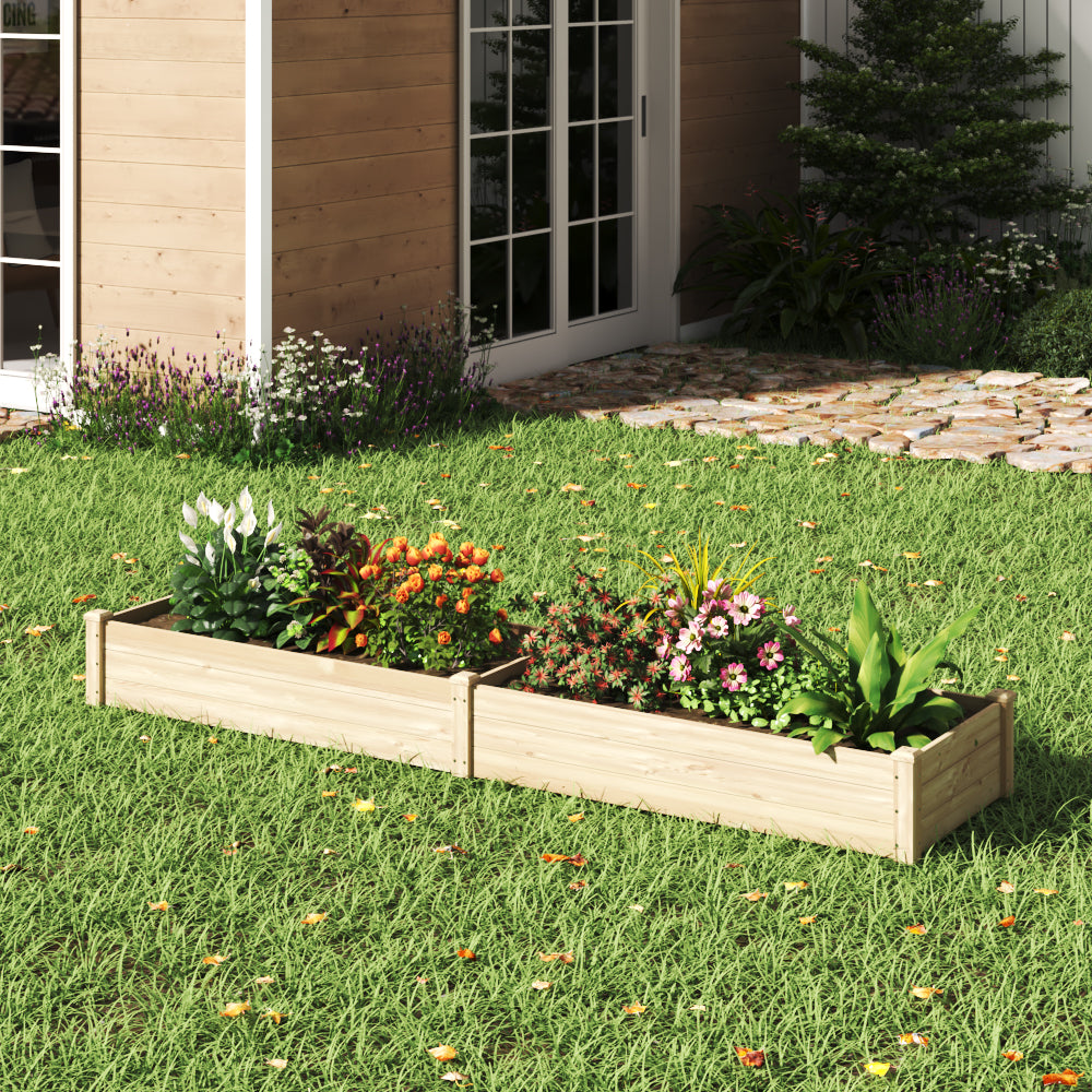 Close-up of Solid Wood Raised Garden Bed with 2 Compartments showing plants growing in separate sections