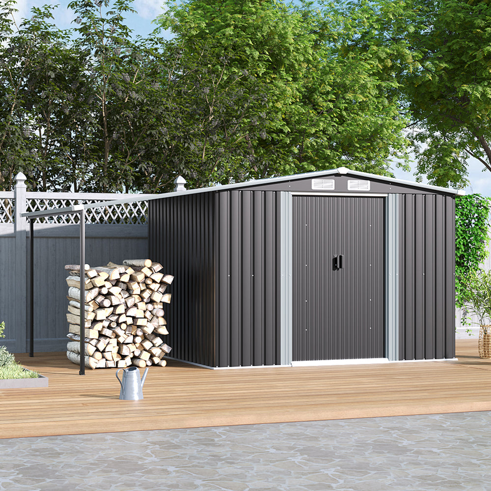 8x6ft metal log store shed placed against fence with stacked firewood – perfect for organized backyard storage