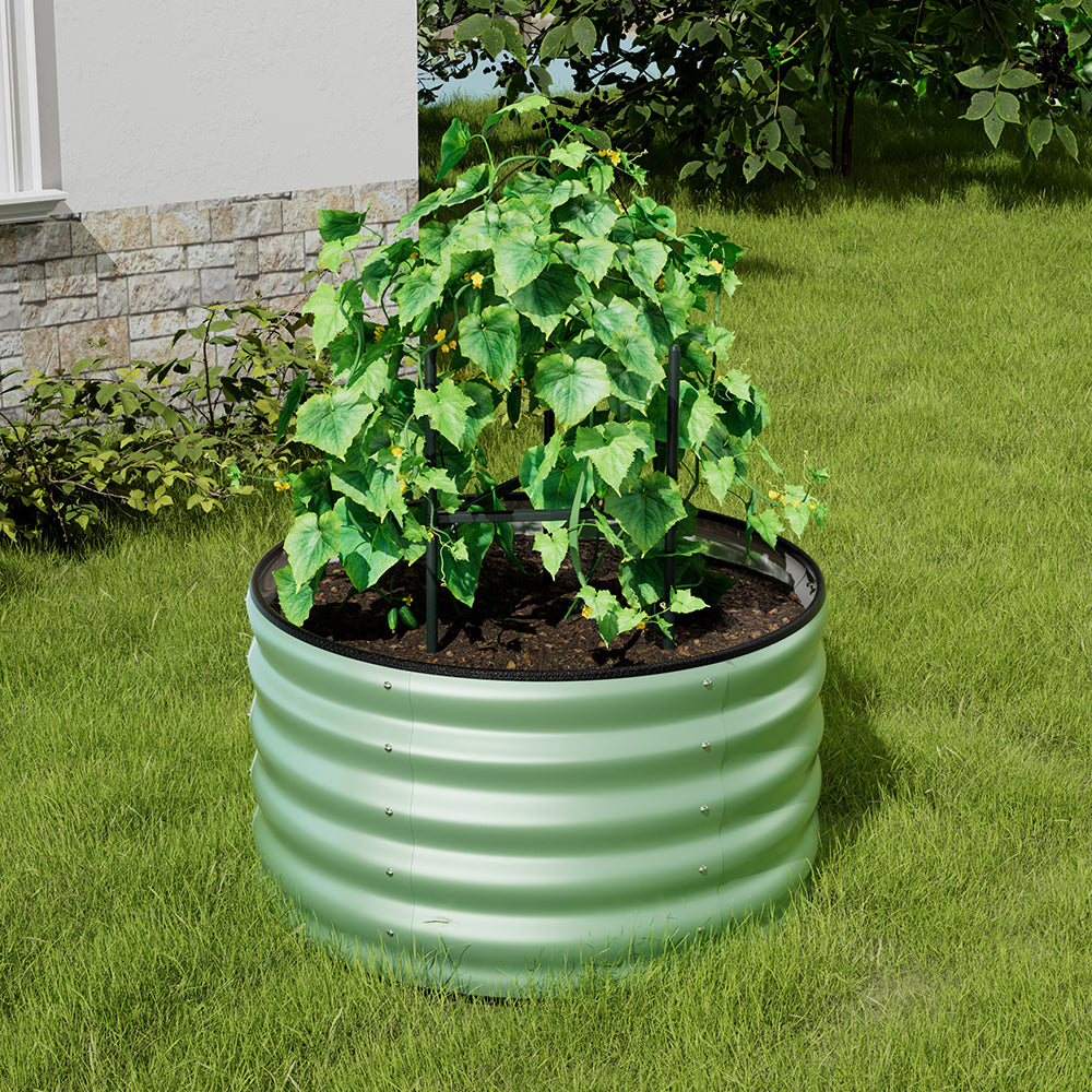 Light green galvanized steel raised garden bed in garden setting – perfect for outdoor planting and landscaping