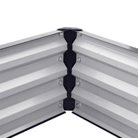 Detailed view of internal corner of charcoal black metal raised bed – secure and durable planting area