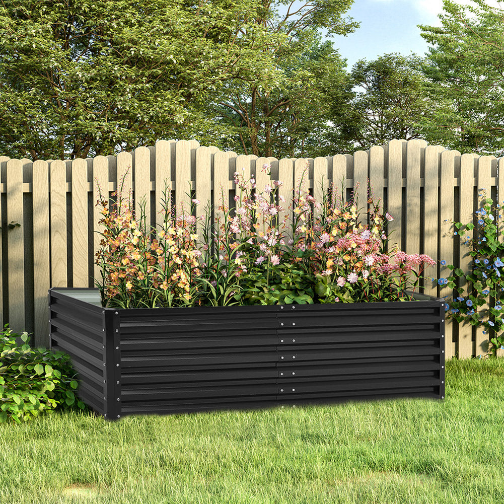 Galvanized steel raised garden bed in backyard garden – perfect for growing vegetables and flowers